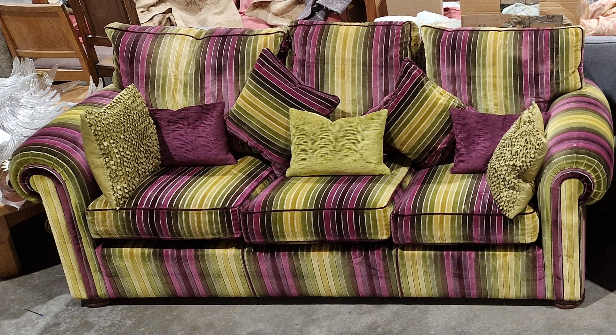 Duresta three-seater sofa covered in a multi-coloured fabric, with a selection of cushions, 225cm