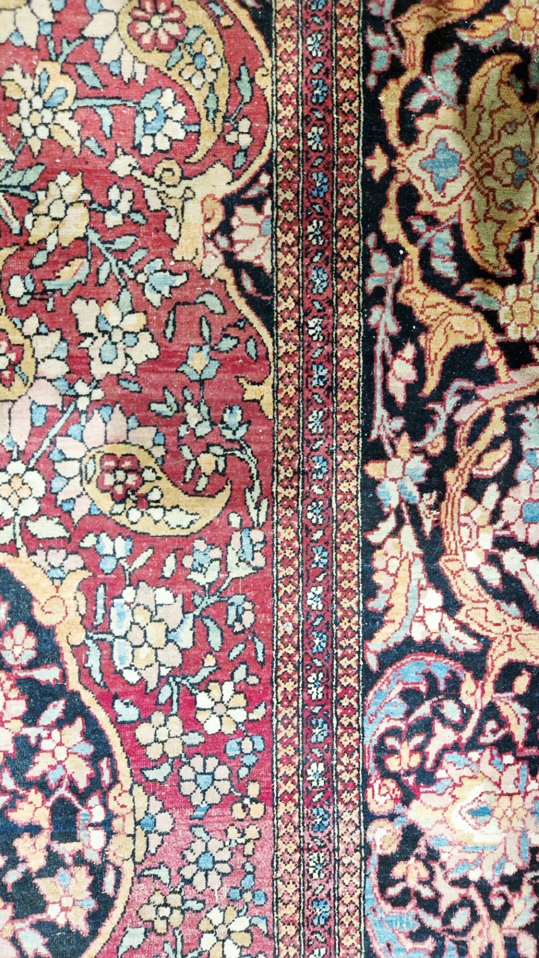 Eastern wool rug of Persian design, having black arabesque to the cherry red field with allover - Image 9 of 32
