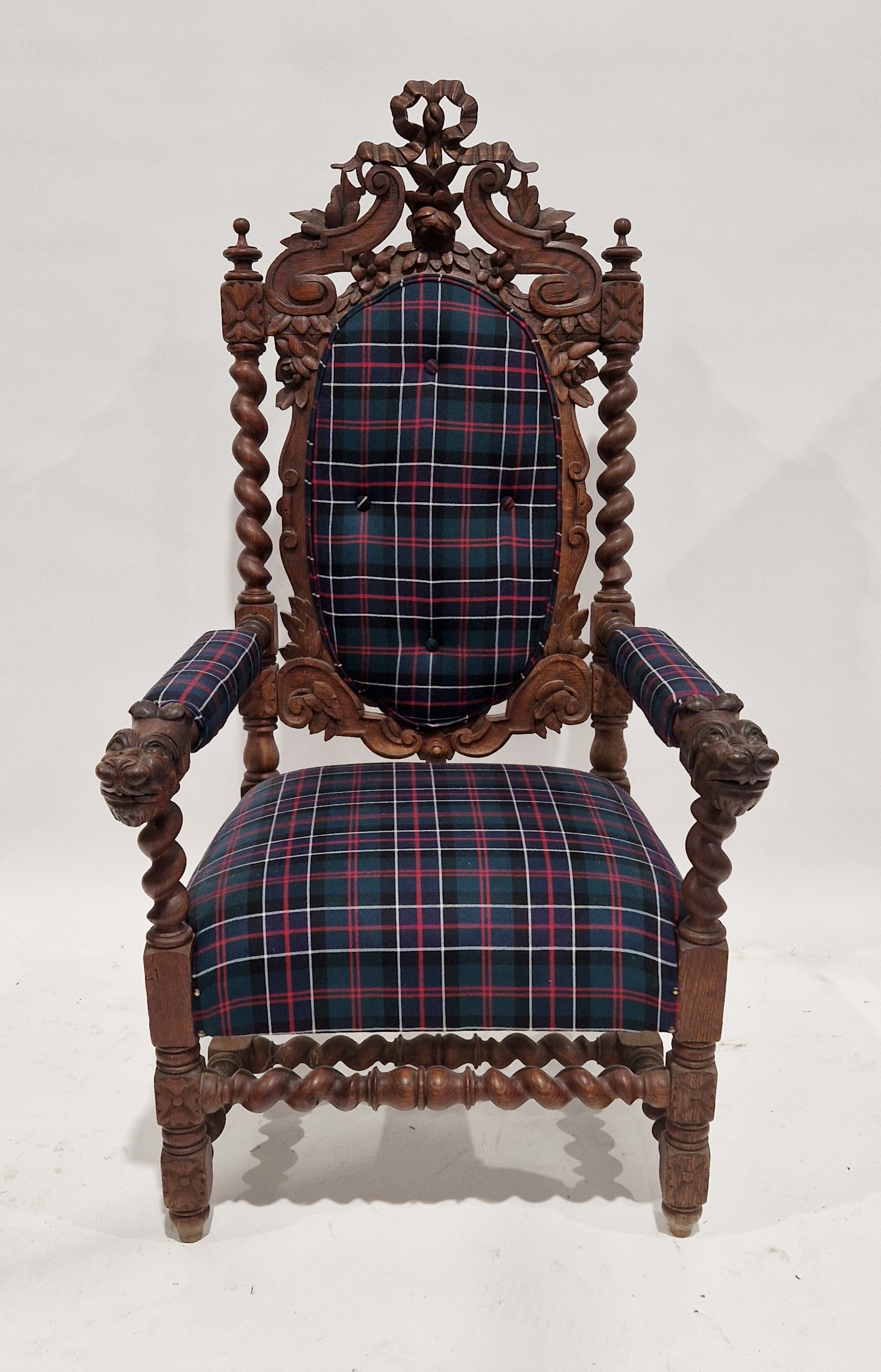 Late 19th/early 20th century carved oak throne chair with later upholstered seat, back, base and