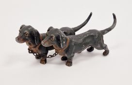 Austrian-style cold painted cast metal pair of dachshunds, early 20th century, each cast standing