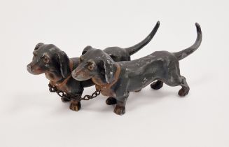 Austrian-style cold painted cast metal pair of dachshunds, early 20th century, each cast standing