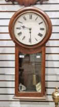 Late 19th/early 20th century oak-cased drop dial wall clock having Roman numerals, glazed case