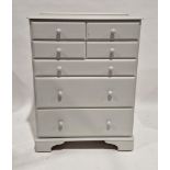 Ducal white painted chest of drawers with four short drawers above three long graduating drawers,