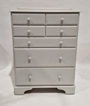 Ducal white painted chest of drawers with four short drawers above three long graduating drawers,