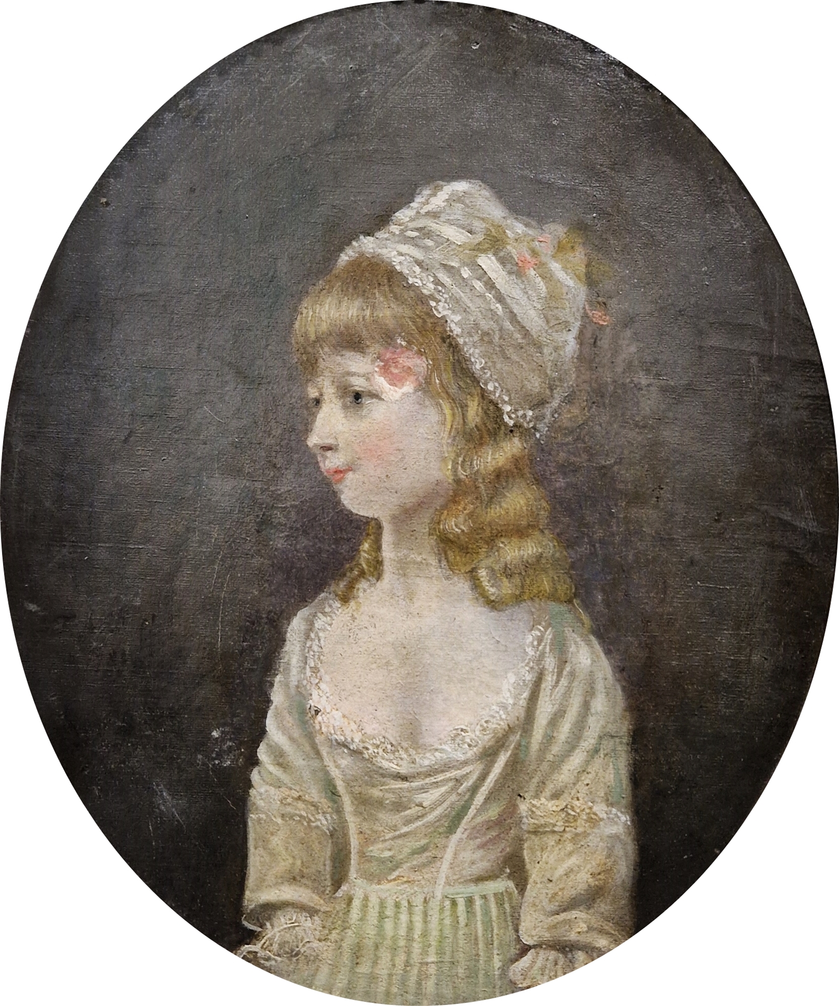 19th century school Oil on canvas Half-length portrait of a young girl, unsigned, oval framed,