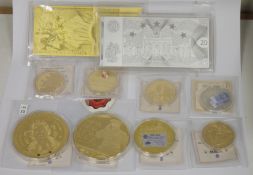Group of commemorative coins including a gold plated Winston Churchill 'Never Never Never Give Up'