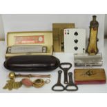 Koch chromatic harmonica in original box, three vintage bottle openers, a chrome coin purse, a