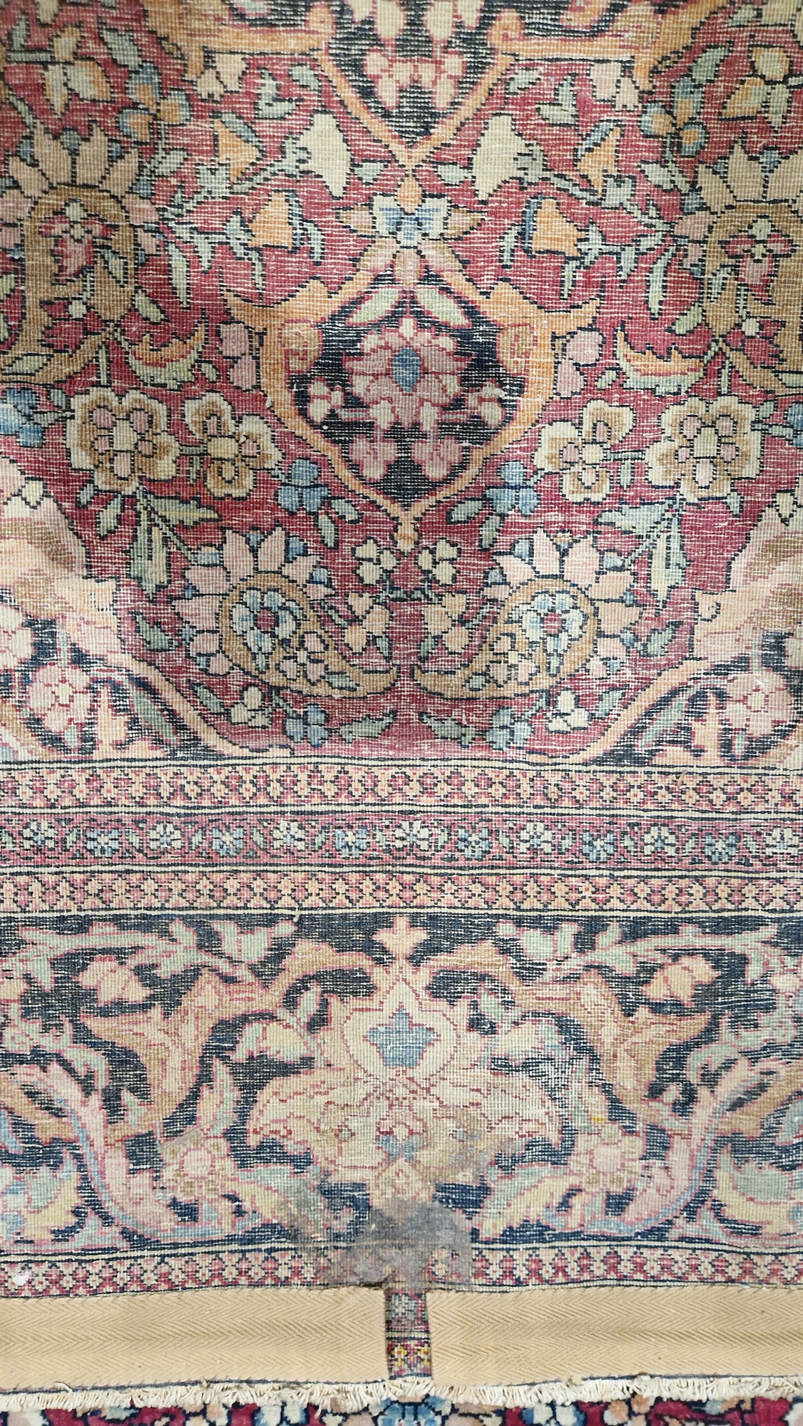Eastern wool rug of Persian design, having black arabesque to the cherry red field with allover - Image 23 of 32
