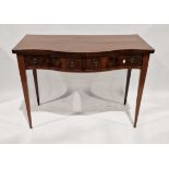 George III mahogany side table, serpentine-fronted with two frieze drawers with circular brass