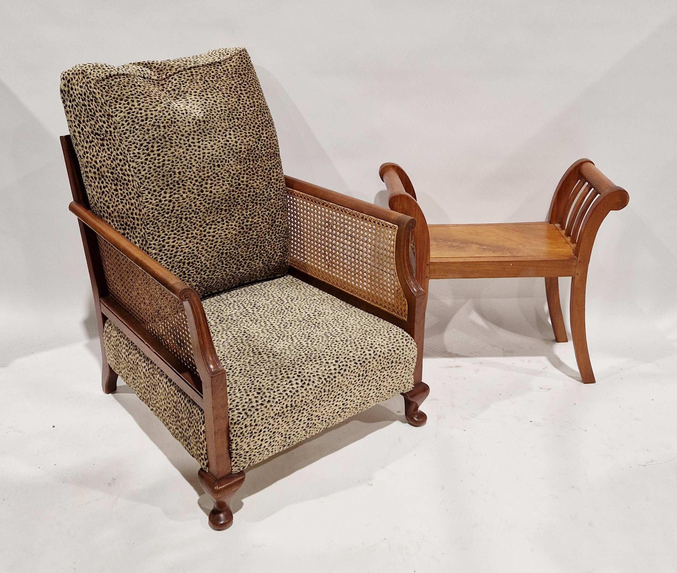 Bergere armchair with later leopard print upholstered seat base and cushion and a hardwood stool (2)