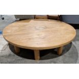 Large oak coffee table of circular form, 38cm high x 145cm diameter