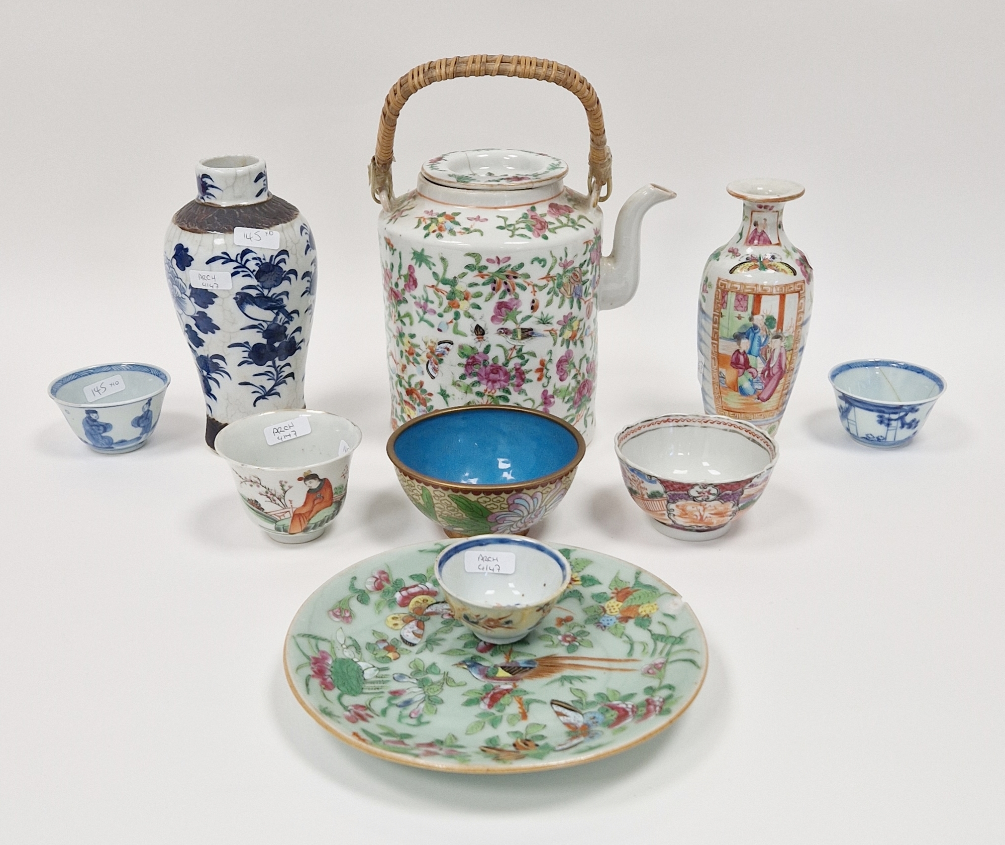 Canton famille rose cylindrical tea kettle and cover, an oviform vase, a pair of Kangxi blue and