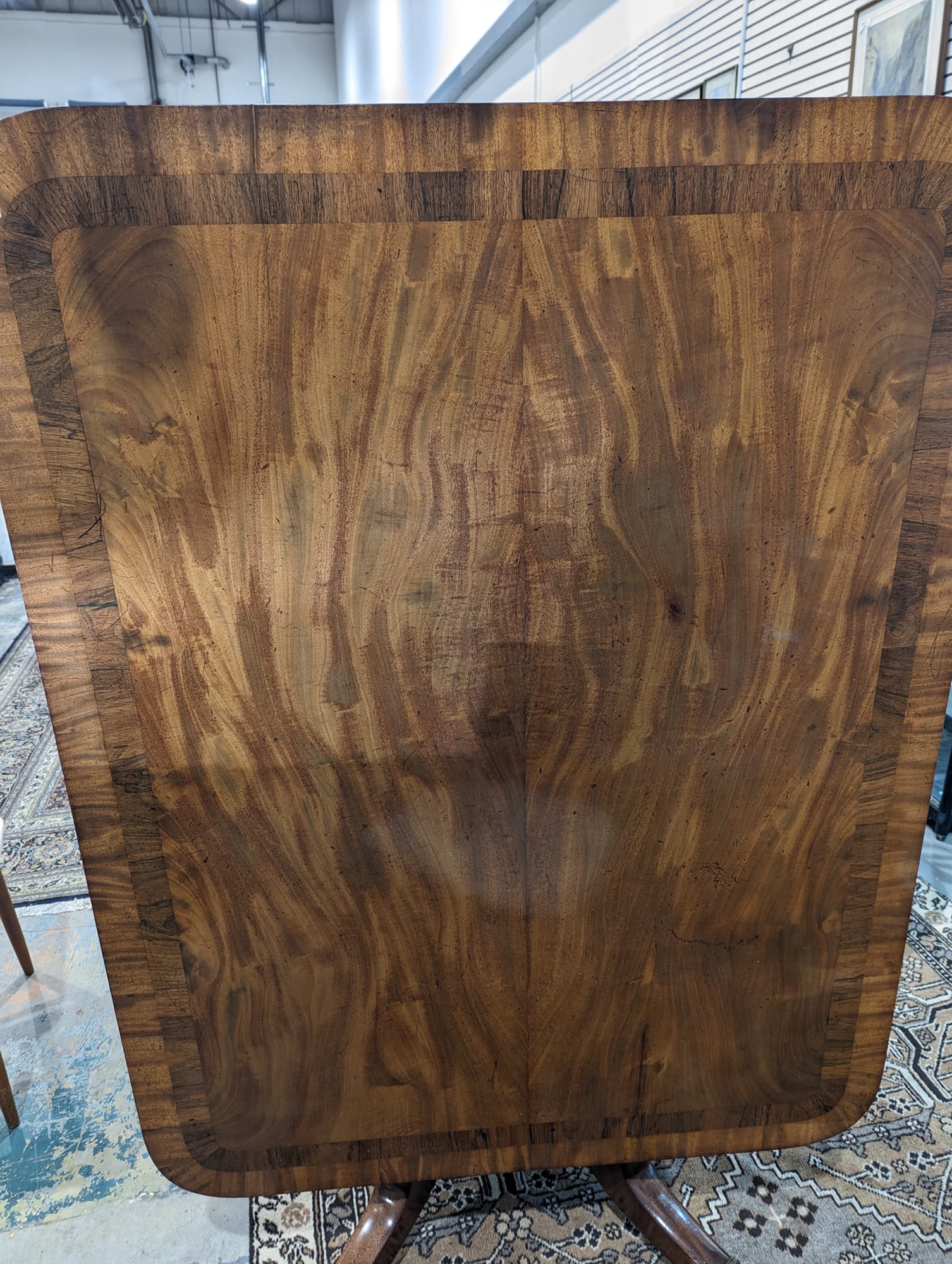 Regency mahogany breakfast table, rectangular with curved corners, rosewood inlaid banding, on large - Image 6 of 26