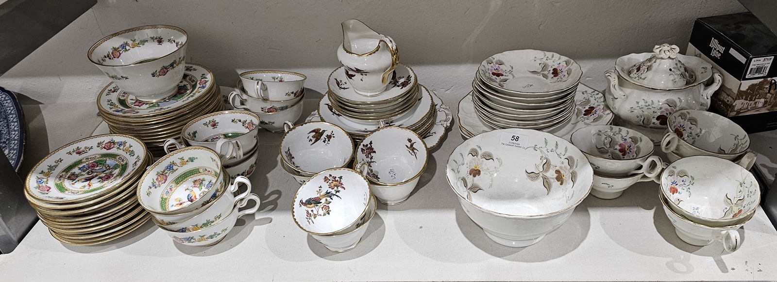 Three English porcelain and bone china part tea services comprising a New Chelsea Staffordshire