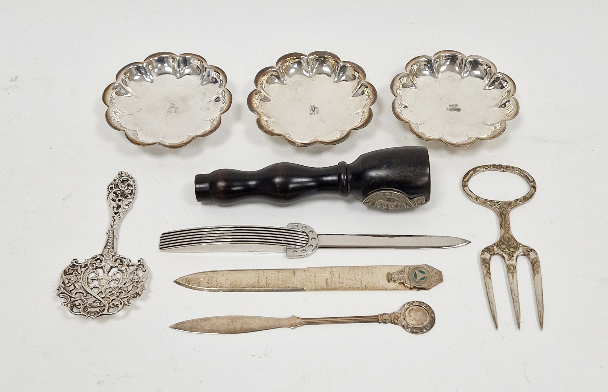 Set of three Chinese white metal pin dishes, each with character mark to the centre, gross weight