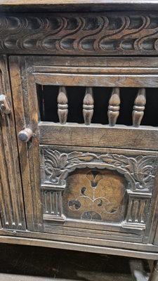 18th century oak dole cupboard, the two cupboard doors with turned spindle sections, carved and - Image 10 of 25