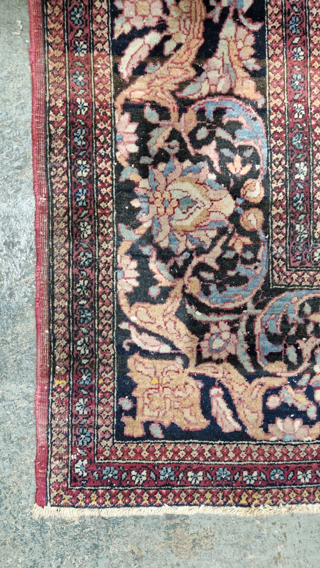 Eastern wool rug of Persian design, having black arabesque to the cherry red field with allover - Image 20 of 32