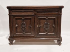 Late 19th/early 20th century stained oak credenza, with moulded oval top above a slide, two panelled