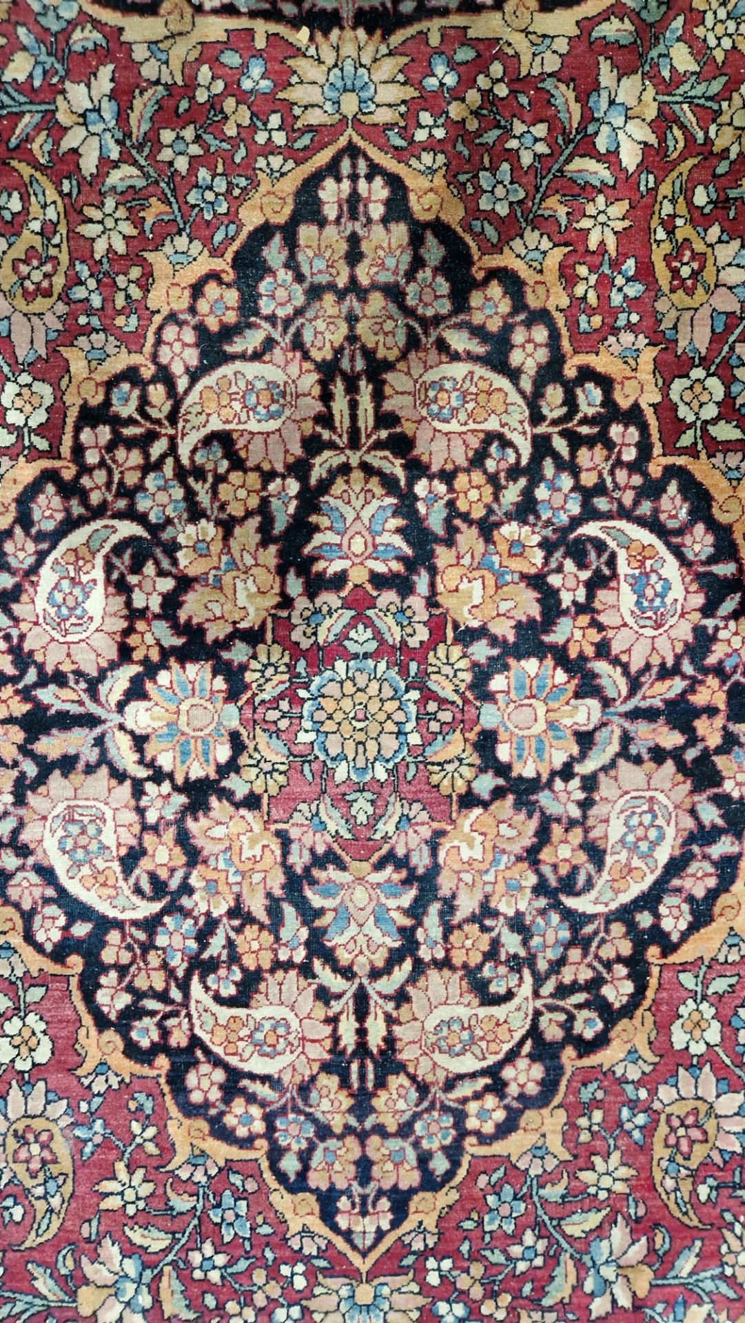Eastern wool rug of Persian design, having black arabesque to the cherry red field with allover - Image 10 of 32