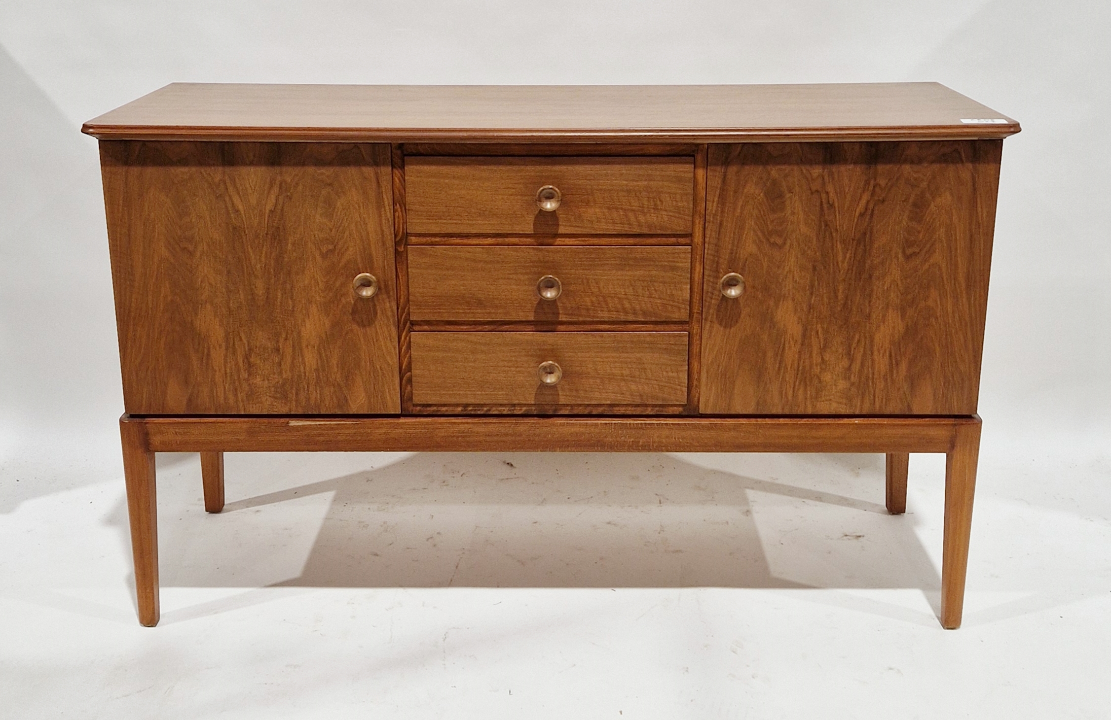 Gordon Russell of Broadway mid-century walnut sideboard, three central drawers flanked by two