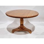 Pine circular dining table on substantial turned column and tripod base, 79cm high x 118cm diameter