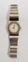 Lady's Omega Constellation wristwatch, gold and stainless steel, the circular dial with raised dot