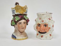 English creamware bacchic moulded jug decorated with a satyr mask and a Staffordshire pearlware