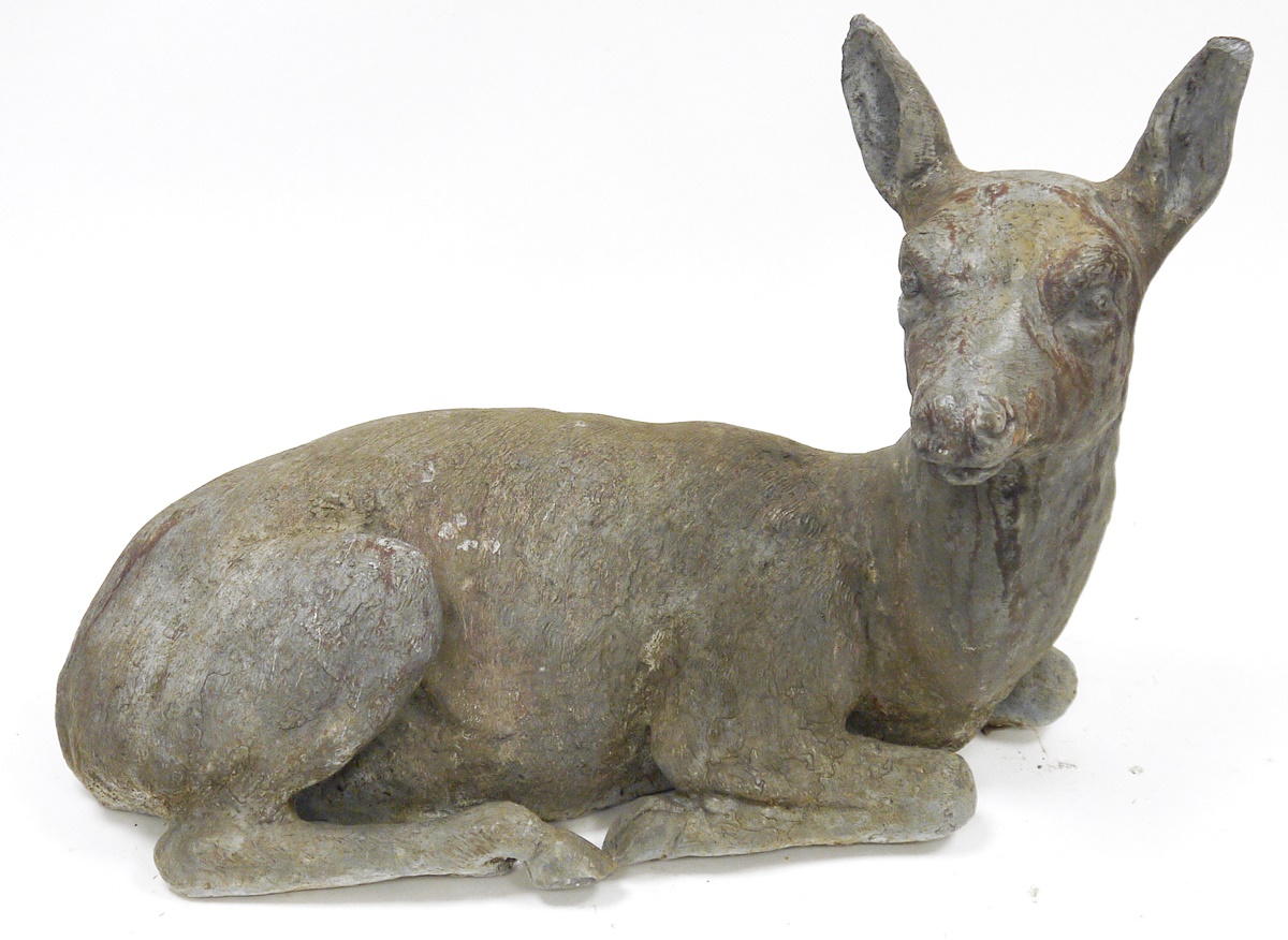 Grey-painted cast lead garden model of a doe, modelled recumbent, 48cm long  Condition Report