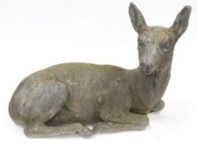 Grey-painted cast lead garden model of a doe, modelled recumbent, 48cm long  Condition Report