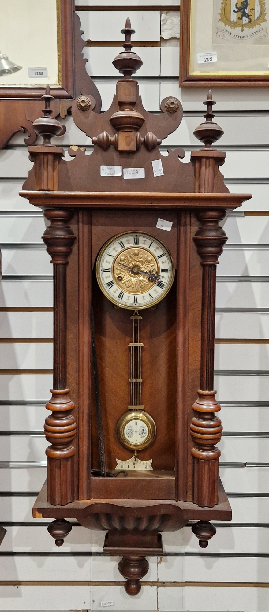 Late 19th century Vienna regulator-style mahogany cased wall clock with three finials to the