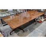 Regency-style mahogany extending two-pillar dining table, 73.5cm high x 118cm wide x 149cm long
