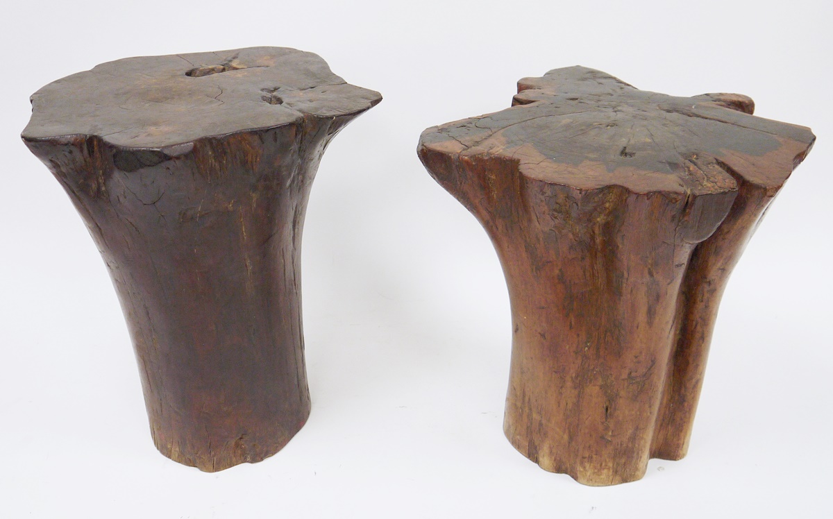 Two contemporary African polished tree stump stools, one possibly ebony, 36cm high