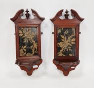 Pair late Victorian/Edwardian mahogany wall brackets, each with broken swan neck pediment, inset