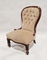 Victorian mahogany buttonback nursing chair, on turned front legs with castors, 89cm high