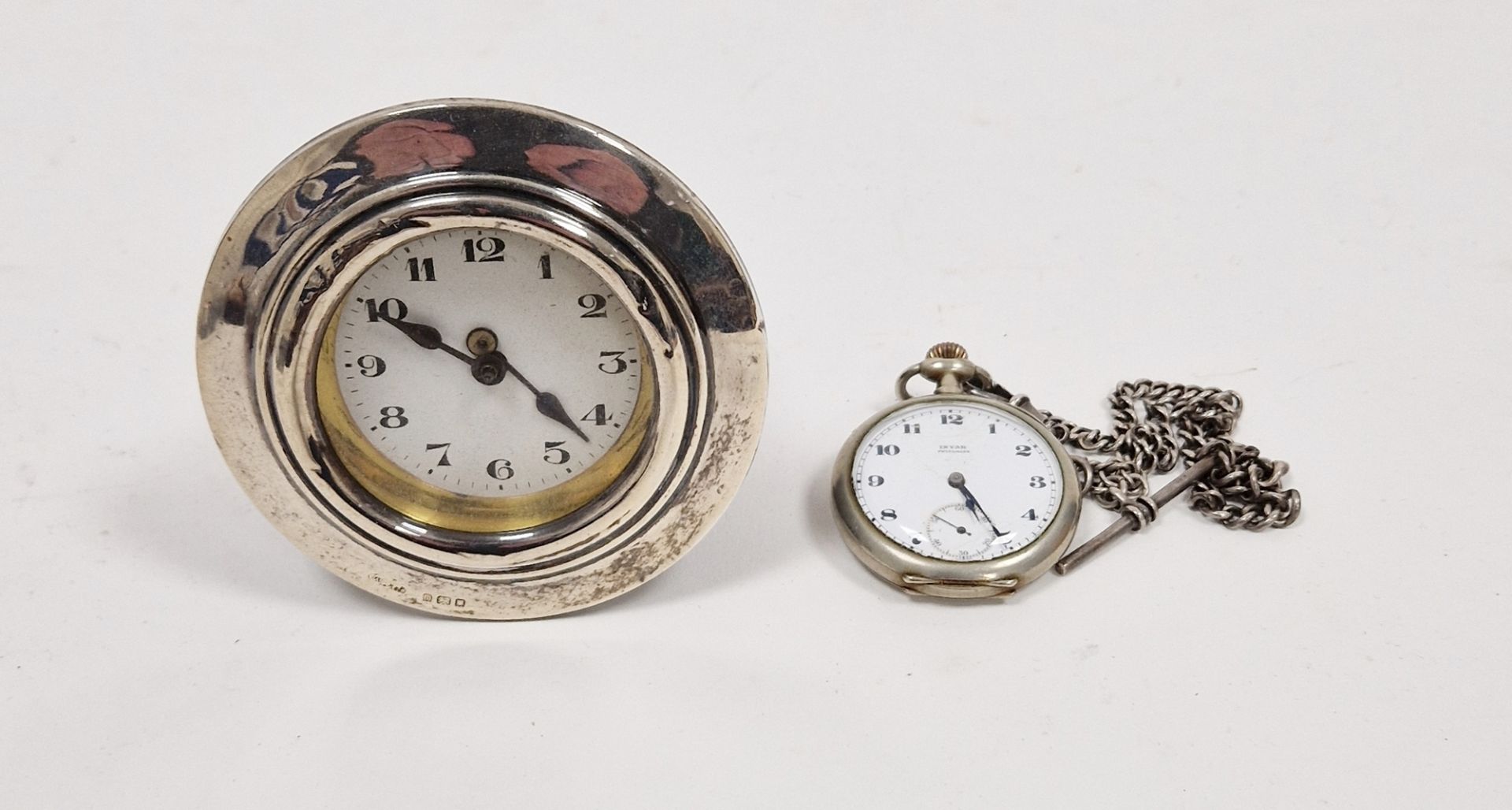 Early 20th century silver-mounted desk clock of circular form, the dial with Arabic numerals