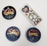 Three Moorcroft commemorative small circular Centenary dishes, boxed, each tube-lined with date