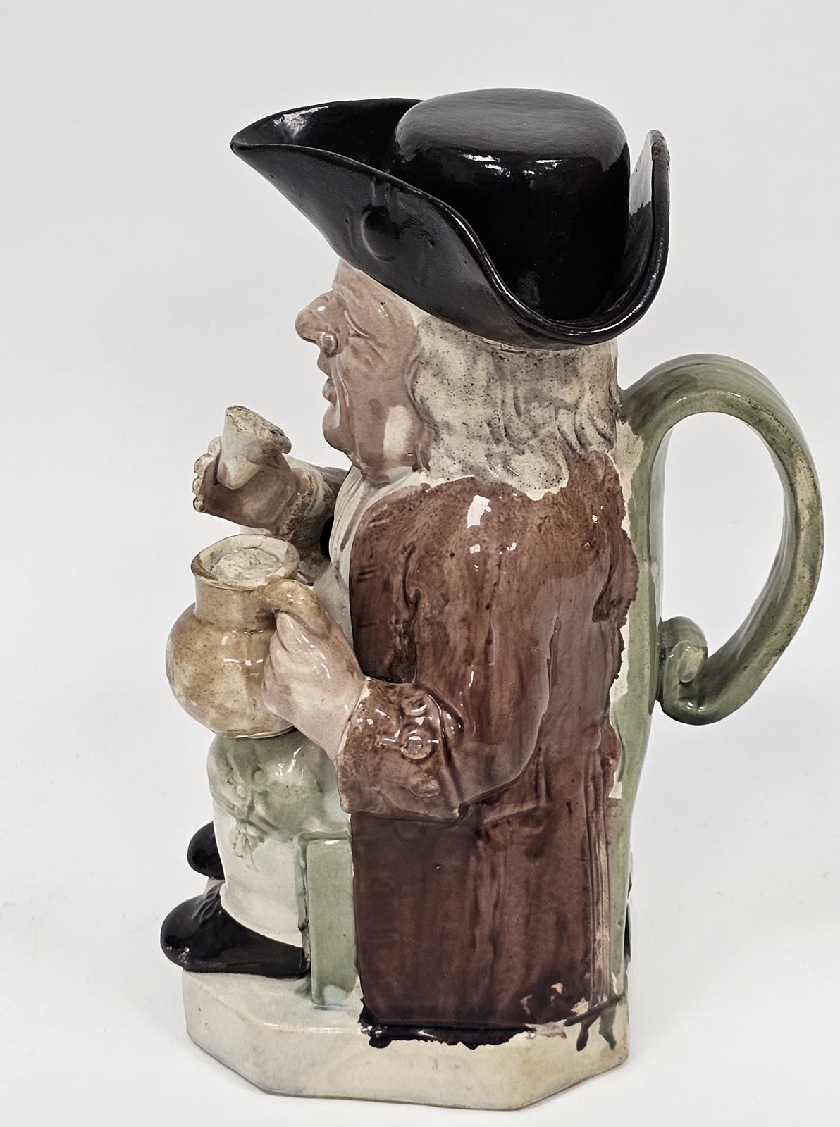 Late 18th century Ralph Wood-type creamware toby jug and cover, modelled seated holding a mug of ale - Image 2 of 10