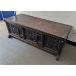 18th century oak coffer of rectangular form with carved foliate friezes to the front panel, 50cm