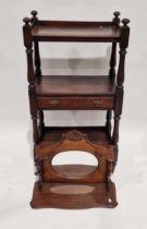 Edwardian mahogany wall bracket with oval mirror and single shaped shelf, 57cm wide and a