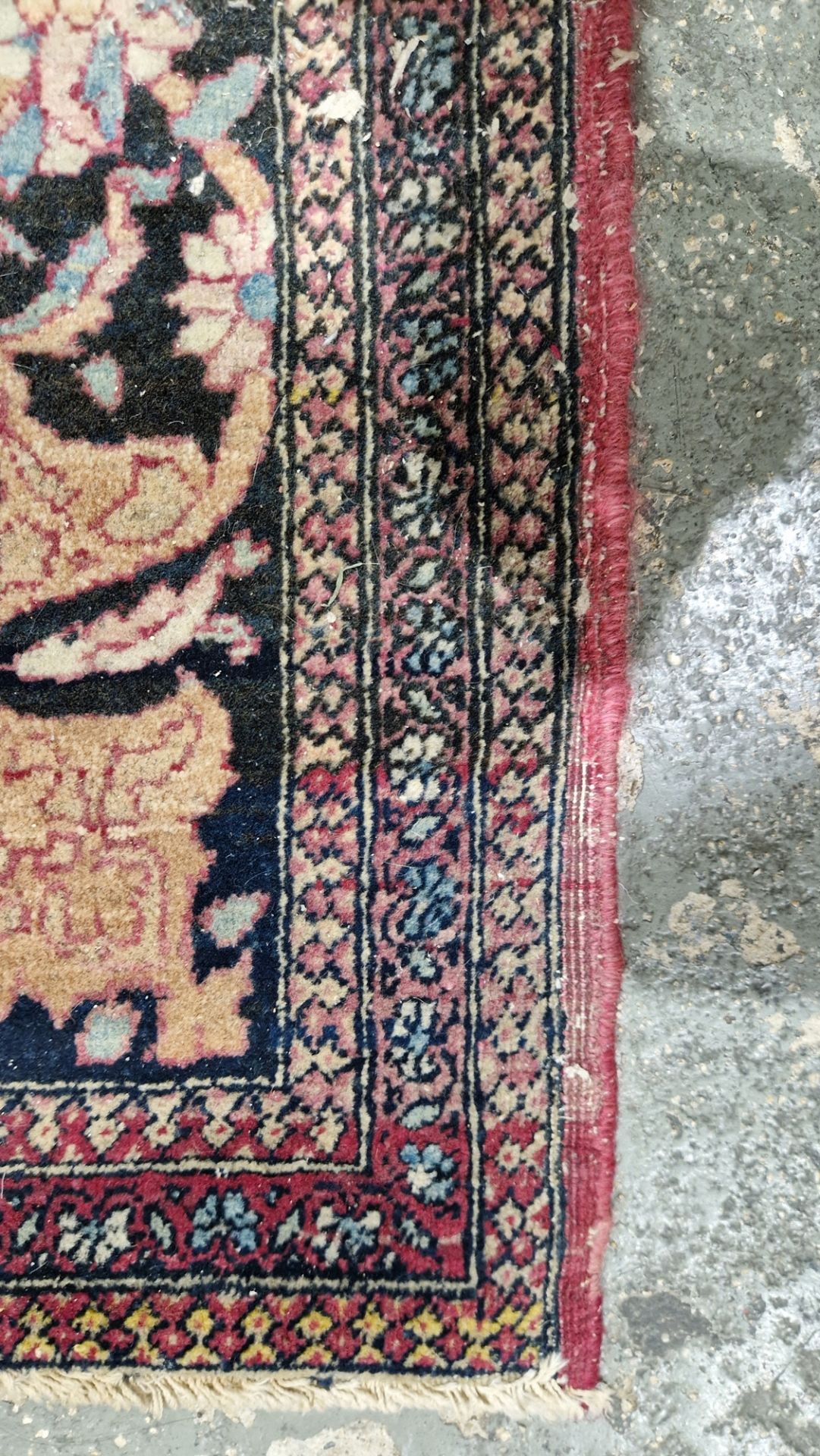 Eastern wool rug of Persian design, having black arabesque to the cherry red field with allover - Image 17 of 32
