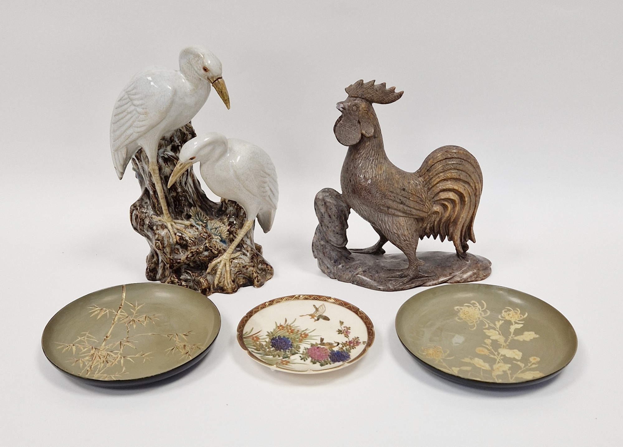 Japanese Meiji period (1868-1912) satsuma saucer decorated with birds amongst flowering shrubs,