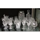 Various items of cut glass tableware including wine glasses in sizes, brandy balloons, water
