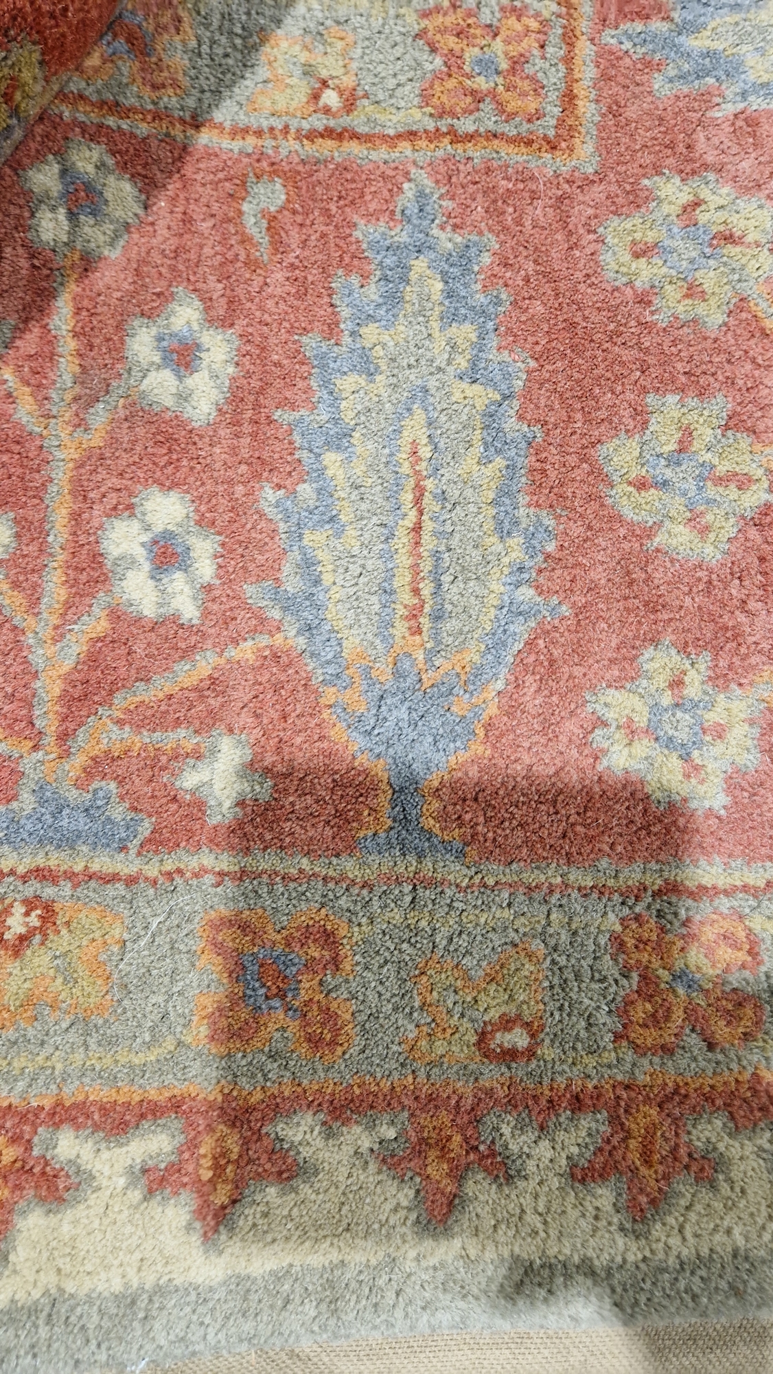 Large wool carpet of revived Eastern style, having stiff leaf and floral spray iron red border and - Image 5 of 22