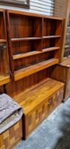 20th century veneered sideboard, the top with five shelves over a two door cupboard, 182cm high x