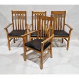 Set of four modern oak dining chairs with leatherette seats, 102cm high (4)