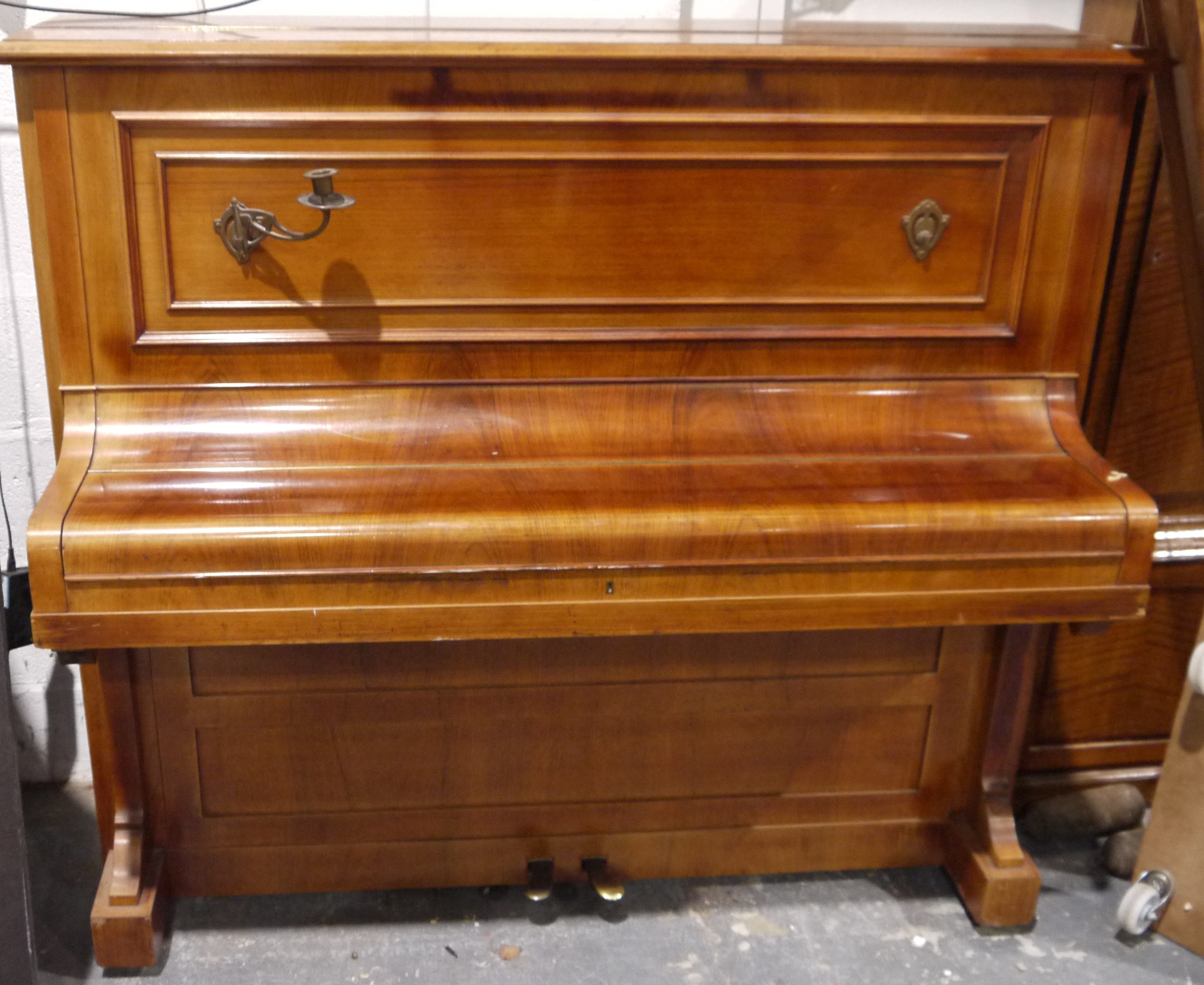 C Bechstein mahogany-cased upright piano forte c 1905/6, iron framed and with brass candle