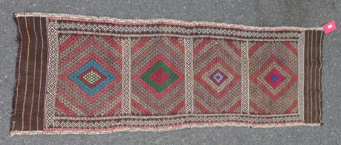 Eastern kelim runner with four lozenge filled sections and stripes to the ends, 190cm x 60cm