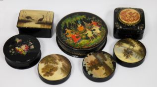 Collection of Russian lacquered small boxes including a circular one depicting a camp scene,