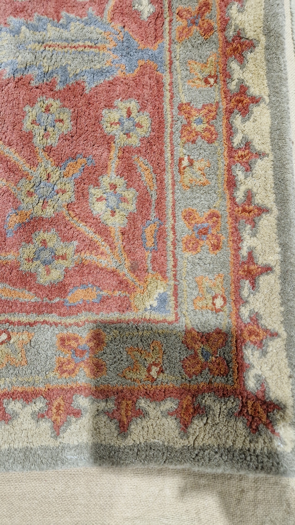 Large wool carpet of revived Eastern style, having stiff leaf and floral spray iron red border and - Image 2 of 22