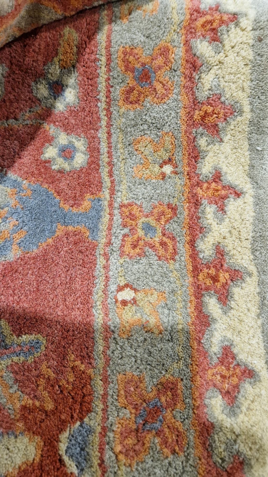 Large wool carpet of revived Eastern style, having stiff leaf and floral spray iron red border and - Image 4 of 22